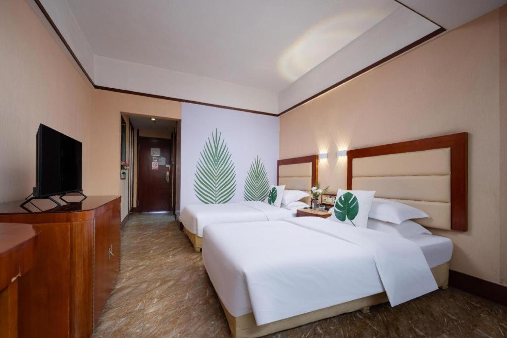 Wings Hotel Гуанчжоу Экстерьер фото