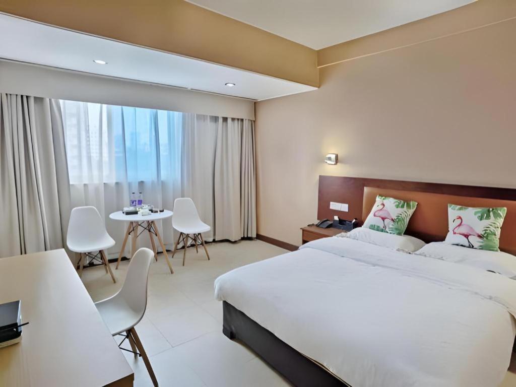 Wings Hotel Гуанчжоу Экстерьер фото