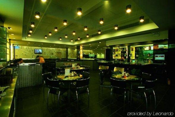 Wings Hotel Гуанчжоу Ресторан фото